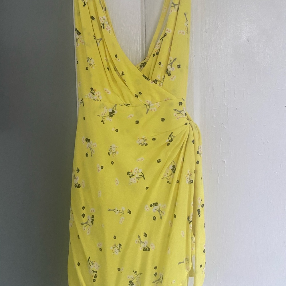 Yellow free people romper with tie detail